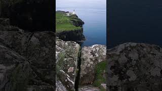 Neist point lighthouse Isle of Skye Scottish Islands UK  View from nearby cliff [upl. by Akimad]