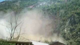 Dramatic footage Huge landslide ravages China village [upl. by Leonsis]