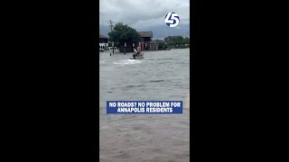 Annapolis residents use boats to navigate flooded streets [upl. by Durtschi675]