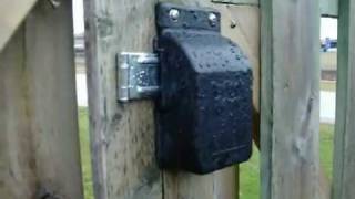 Padlock Protector on a Fence in the Rain [upl. by Marucci923]