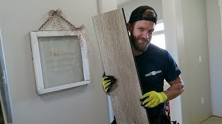 HOW TO PUT IN LAMINATE FLOORING DIY REMODEL [upl. by Cirilo]