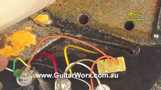 Grounding the bridge on a Flying V Guitar Kit  DIY Guitar Kits [upl. by Hcirteid]