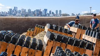 Pyrotechnics workers prepare barge for Seattles 2018 4th of July fireworks show [upl. by Oiragelo]