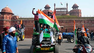 India Farmers race tractors and storm Delhis Red Fort during protests against agricultural reforms [upl. by Wauters]