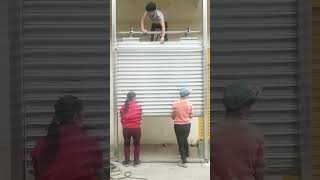 How to install a KENVO manual roller shutter door [upl. by Ellenehc]