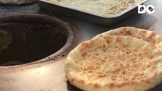 Foodmark  How to make a Nang Xinjiang style pancake [upl. by Ahtamat]