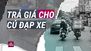 Đạp người chở hàng ngã sõng soài trên đường Hành vi côn đồ sẽ bị xử lý ra sao  VTC Now [upl. by Lee110]