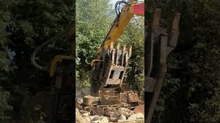 Crusher bucket in action crusherbucket demolition construction diggerattachment trending [upl. by Ahsieni]