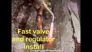 Installing a main water valve and regulator in a hole [upl. by Haym]