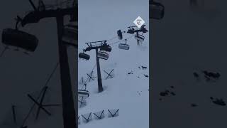 Ski lift passengers rush to safety as strong winds toss gondolas into the air in Italy [upl. by Bullen236]