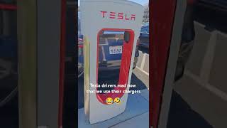 Tesla drivers dont get aggressive about it Youve been hogging our FREE chargers this whole time [upl. by Wallford]