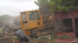 Bulldozer destroys building [upl. by Hooper987]