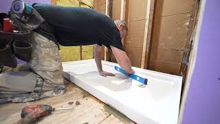 How to Install a Shower Pan Base  PLAN LEARN BUILD [upl. by Rovelli]