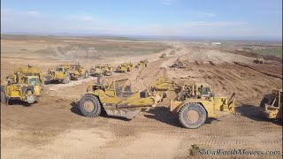 Digging new landfill cell with fleet of Caterpillar scrapers Part 1 [upl. by Vinn620]