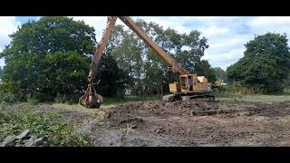 classic Priestman VC20 long reach excavator with grab stacking stone Cromford steam rally 2024 [upl. by Ellerol72]