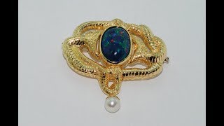 Black opal Handmade brooch 18kt gold with a black opal at the center [upl. by Fini626]