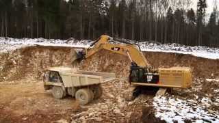 Cat® 390F Excavator at Work Digging and Loading [upl. by Anicul]