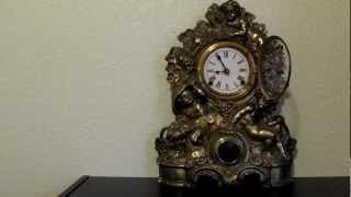 N Muller rare gilded iron front clock [upl. by Hgielrac748]