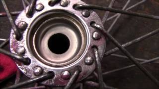 How to Rebuild and Repair a Wheel Bearing on a Bicycle [upl. by Aneles]