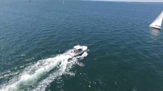 Carolina Classic 28 Footer goes around sail boat in ocean DJI Phantom view [upl. by Rachele]