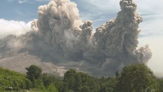 Pyroclastic Flows Swallow Farmland Volcanic Ash Clouds  Sinabung 4K Stock Footage Screener [upl. by Nosaes]