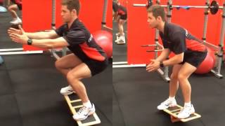 How To Do The Extreme Balance Board Squat [upl. by Bullis]