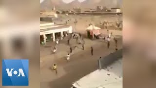 Video Appears to Show People Fleeing Gunfire in Sudans Kassala [upl. by Selin]