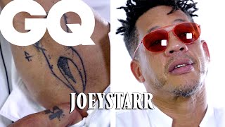 JoeyStarr dévoile ses tattoos  NTM Béatrice Dalle Scorpion  GQ [upl. by Akenahc]