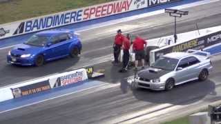 Subaru WRX Hatch vs Subaru STI Drag Race Battle [upl. by Saunder250]