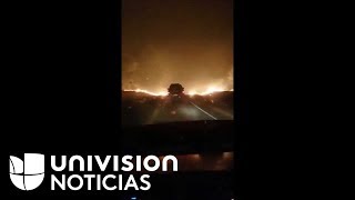 Así conduce entre las llamas una pareja que cruza el incendio en Yuba [upl. by Rehnberg]