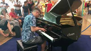 Playing piano in a Roman Airport Kyle Landry [upl. by Conlan102]