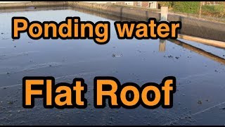 Standing Water on a Roof  Watch how to get water to drain away [upl. by Dedie]