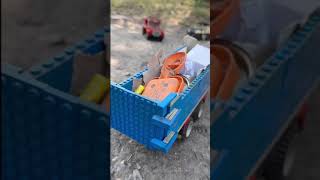 30 yearold Lego trucks hard at work 95 rolloff 93 blackampwhite dump truck 94 red dump class 6 truck [upl. by Garber]