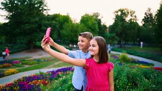 Siblings taking selfie in a public park  camera point of view [upl. by Omsare]