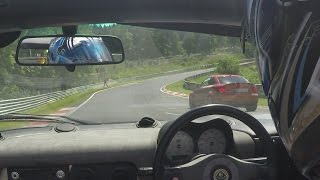 Nurburgring Nordschleife  Idiot overtakes on the right at highspeed in a yellow flag situation 4K [upl. by Sivek]