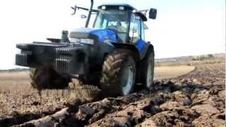 New Holland TM155 ploughing [upl. by Oinotnanauj114]