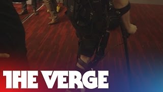 Exoskeleton demo at CES 2014 Ekso Bionics helps Paul Thacker walk again [upl. by Emearg768]