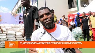 THE FG AND THE ABIA STATE FIRST LADY DISTRIBUTE FOOD PALLIATIVES TO PERSONS WITH DISABILITIES [upl. by Rednael689]