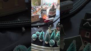 HO Scale Model Trains with my Christmas Village setup hoscale modeltrains christmasvillages hi [upl. by Abana]