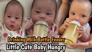 Little Baby Girl Is Hungry Mother Is Feeding Milk Feeder Him [upl. by Ardnod]