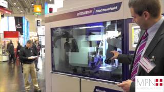 Medical cleanroom two shot micro injection moulding demonstration at Compamed 2012 [upl. by Hasty428]