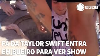 Fã da cantora Taylor Swift entra em bueiro para assistir show [upl. by Gary]