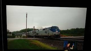 Aurora singing for critters as Amtraks California Zephyr in Agency Iowa with 3 private cars in rain [upl. by Gruber]