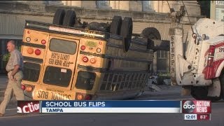 School bus overturns in crash [upl. by Oniluap]