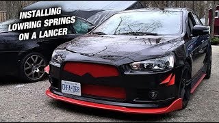 Installing lowering Springs On My Buddys Lancer [upl. by Novyak]