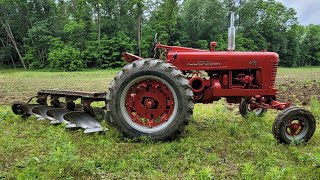 Farmall 400 Plowing with a 4x14 FastHitch Plow [upl. by Enamrej]