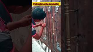 Main gate handle installation 💥maingatedesign maindoor maindoorhandle handmade welding [upl. by Abra742]