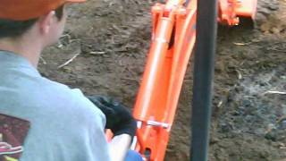 kubota B26 TLB pealing off topsoil [upl. by Orlanta]