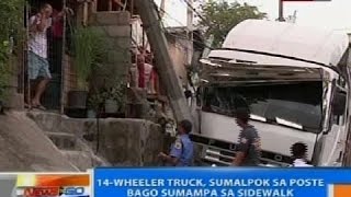 NTG 14wheeler truck sumalpok sa poste bago sumampa sa sidewalk sa Katipunan Avenue [upl. by Helfant]