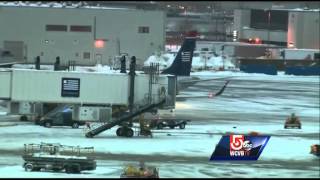 Plane hits deicing truck at Logan [upl. by Gwenni]